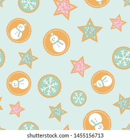 Seamless pattern of winter holiday cookies with snowmen, snowflakes, and stars a mint green background.
