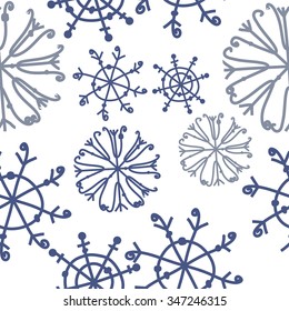 Seamless pattern  of winter  motif, doodles, snowflakes,ellipses, spots, spirals. Hand drawn.