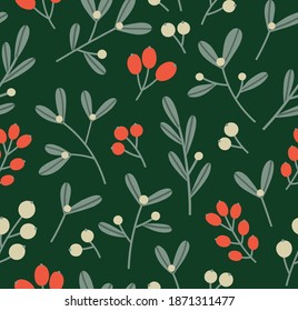 Seamless pattern of winter plants: berries and mistletoe. Hand-drawn Christmas plants on a green background. Suitable for wrapping paper, fabric, decoration. Winter holidays concept.