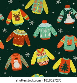 Seamless pattern with winter sweaters. Vector graphics.