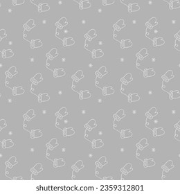 Seamless pattern of winter warm gloves on a gray background