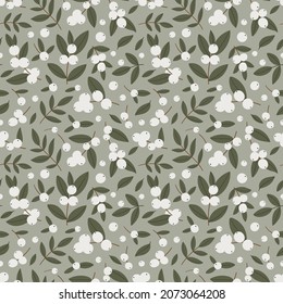 Seamless pattern with winter white berries on an olive background.