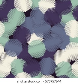 Seamless pattern. Wire wheels. Chaotic 
spread. Fashion camouflage.
