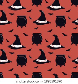 Seamless pattern with witch hat and bats on an orange background. Halloween design. Vector graphics.