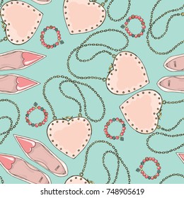 Seamless pattern of women accessories on a blue background.