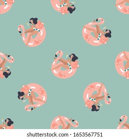 Seamless pattern with Women swimming on the flamingo inflatable ring