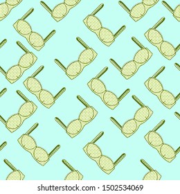 Seamless pattern with women's bras. Vector illustration