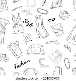 Seamless pattern with women's clothing and accessories. Set of fashion doodles of clothes and shoes. Set of hand drawn online fashion shopping. Fashion sketches. Casual style. Sketches of clothes.