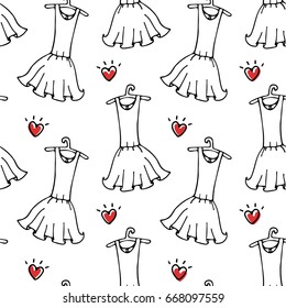 Seamless pattern with women's dresses on a hanger
