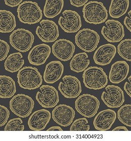 Seamless  pattern from wood saw cuts.Background in vector.
