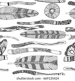 Seamless pattern with wooden branches, Painted Sticks,  Feathers, flowers. Doodle style. Black and white, boho, vector, tribal design elements.