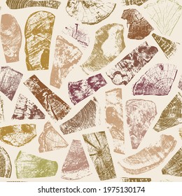 Seamless pattern with wooden imprints of various colors, textures and shapes on a light backdrop. Abstract vector background with wood elements in retro style. Wallpaper, wrapping paper, flooring
