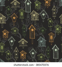 Seamless  pattern from the wooden nesting boxes drawn by hand.Birdhouse made of boards.Background in vector.