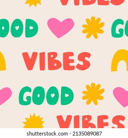 Seamless pattern with words good vibes, hearts, sun and rainbow. Simple colorful shapes. Cute hippie style. Vector background