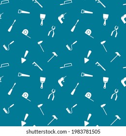 Seamless pattern with work tools. Isolated working equipment on blue background. Vector illustration for wallpaper.