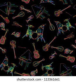 Seamless pattern for wrapping paper or background with musical instruments over black.
