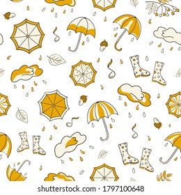 Seamless pattern with yellow autumn items umbrella, cloud with rain, rubber boots