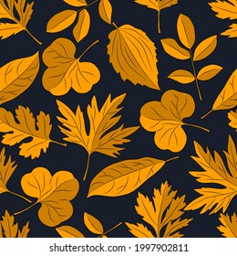 Seamless pattern with yellow autumn leaves on dark background. Vector