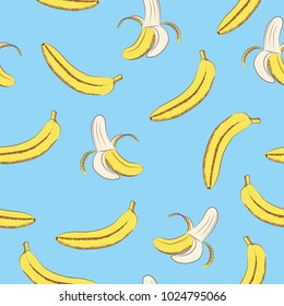 Seamless pattern of yellow bananas on a blue background.