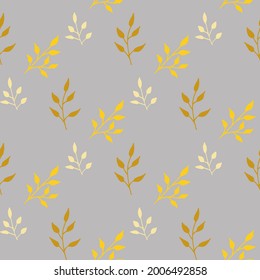 Seamless pattern with yellow and beige branches on gray background. Vector image.