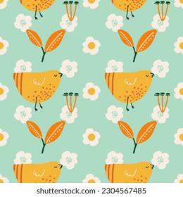 Seamless pattern with yellow birds or hens on green background. Texture for fabric, wallpaper, textile, apparel, wrapping paper, banner, print, card, gift, fabric, advertising, fabric