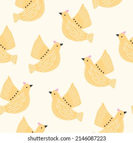 Seamless pattern with yellow birds of peace in flight. Animal print on baby clothes or wallpaper in bohemian and retro style.