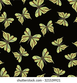 Seamless pattern with yellow butterflies on the black background. Vintage texture. Summer backdrop. Vector illustration.