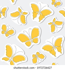 Seamless pattern of yellow butterfly stickers.