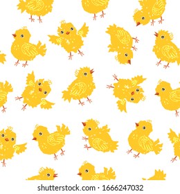 Seamless pattern with yellow chickens. Vector graphics.