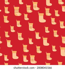 Nahtloses Muster mit gelben Weihnachtssocken. Illustration für Design, Web, Wickelpapier, Stoff, Tapete