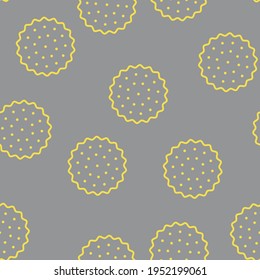 Seamless pattern. Yellow crackers on a gray background