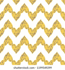 seamless pattern with yellow doodle hand drawn hearts