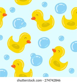 Seamless pattern with yellow ducks