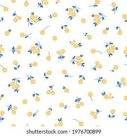 Seamless pattern with yellow flowers and blue leaves