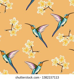 Seamless pattern with yellow flowers. Floral décor of plumeria branch and exotic tropical humming bird. Elegant tropical floral print for fabric design, woman dress, background, wrapping paper, cover.