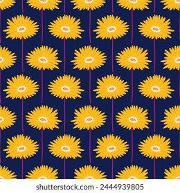 Seamless pattern with yellow gerbera flowers on a dark blue background. Summer bright floral vector illustration. Spring botanical print, modern style design