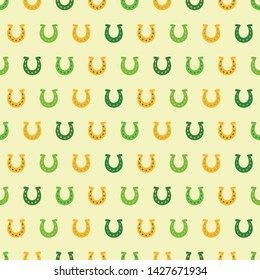 Seamless pattern with yellow and green horseshoes