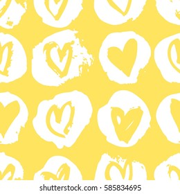 Seamless pattern with yellow hearts. Hand drawn vector illustration. Decorative elements for design. Creative art work