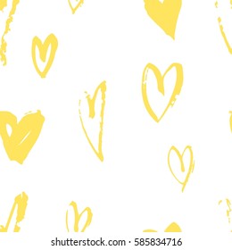 Seamless pattern with yellow hearts. Hand drawn vector illustration. Decorative elements for design. Creative art work