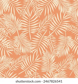 Seamless pattern of yellow leafs on a orange background. Presented through a scattered positioning of leafs. The pattern is ideal for printing on fabric, textiles and paper products.