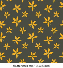 Seamless pattern with yellow leaves on a dark background