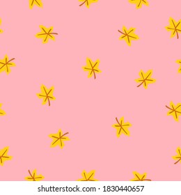 Seamless pattern with yellow maple leaves. Brown stem. Pink background. Autumn or summer. Nature or ecology. Doodle cartoon style. For postcards, wrapping paper textile, wallpaper and scrapbooking