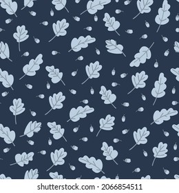 Seamless pattern with yellow oak leaves and acorns on dark blue background. Autumn concept. For surface design and other design projects