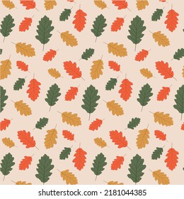 Seamless pattern with yellow, orange and green autumn oak leaves Perfect for wallpaper, gift paper, pattern fill, web page background, autumn greeting cards.