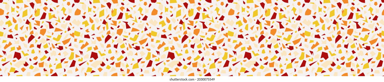 Seamless pattern with yellow and orange terrazzo design.