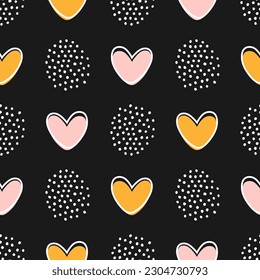 Seamless pattern with yellow and pink heart with white dots and black background