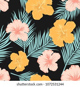 Seamless pattern yellow and pink hibiscus tropical flowers on black background.printing wallpaper.vector illustration