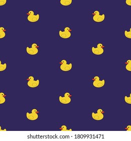 A seamless pattern with yellow rubber ducks on a blue background.