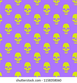 Seamless pattern with yellow skulls on the violet background