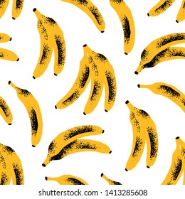 Seamless pattern of yellow textured bananas.